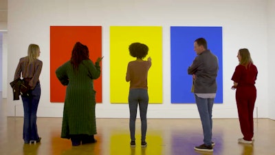 The Milwaukee Art Museum and Milwaukee skyline as seen aerially from over Lake Michigan looking West.